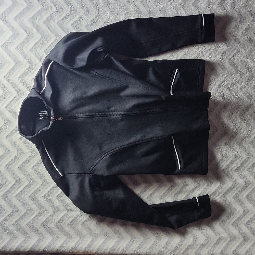 Kate Lord Golfing aperal sports zip up black fitted jacket